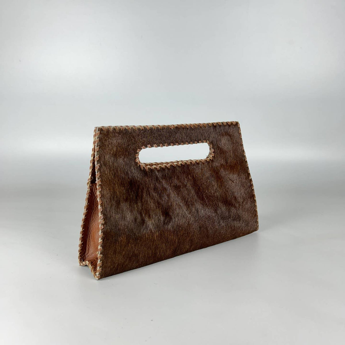 Mia Clutch in Cowhide Hairon Leather